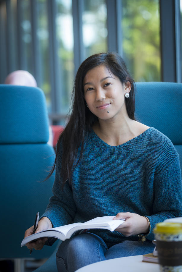 Fenwick Library Student in Mason's Fenwick Library on the Fairfax Campus